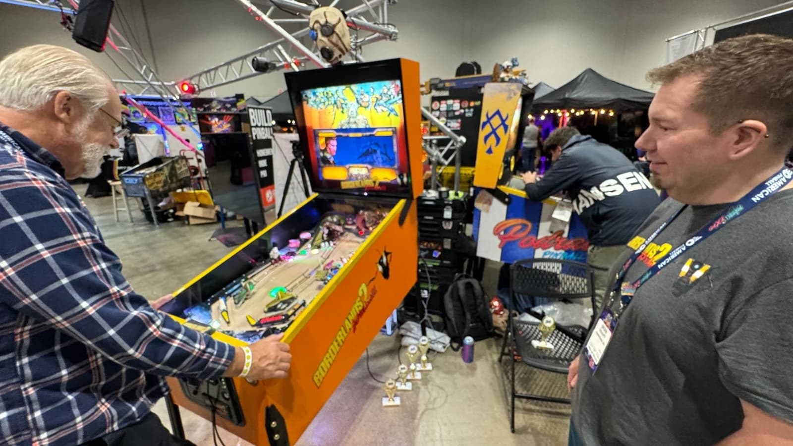 Brian Doughty watches someone play his homebrew, Borderlands 2.