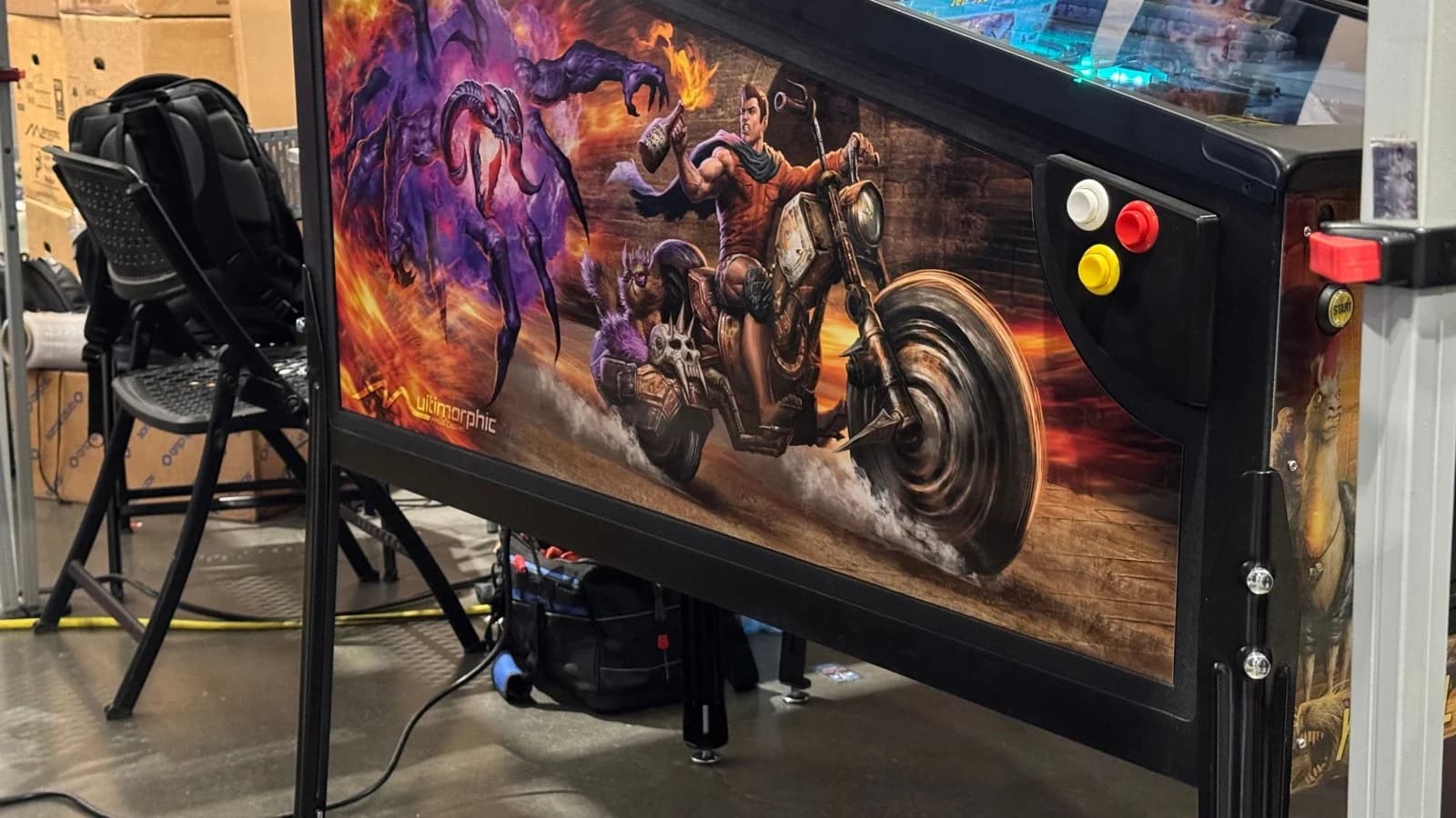 P³ cabinet art of a rider on a motorcycle