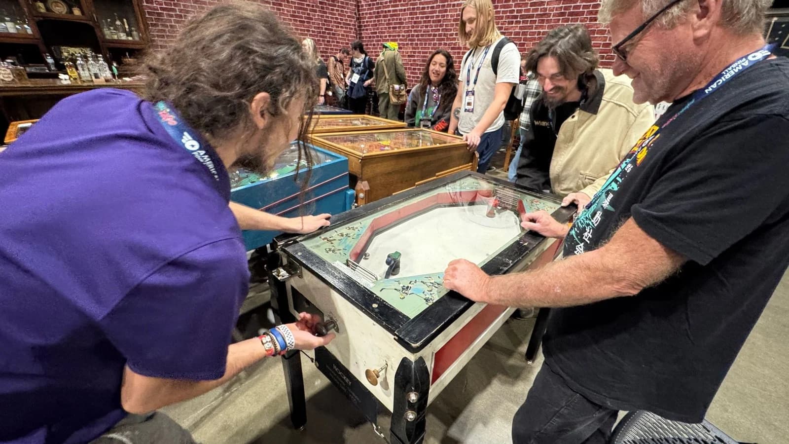 Two players at a vintage tabletop game