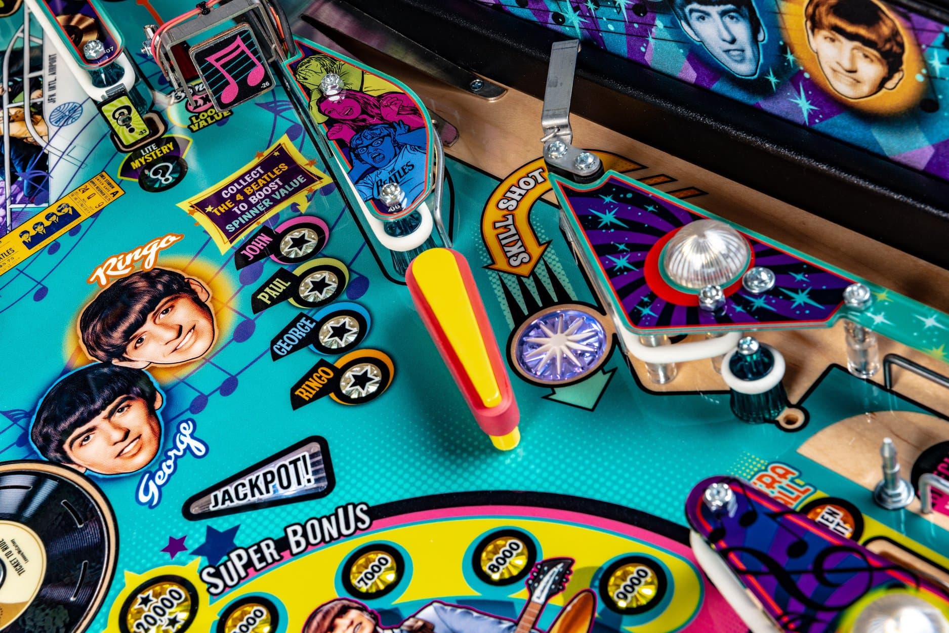 The Beatles pinball machine with colorful game board and playfield details