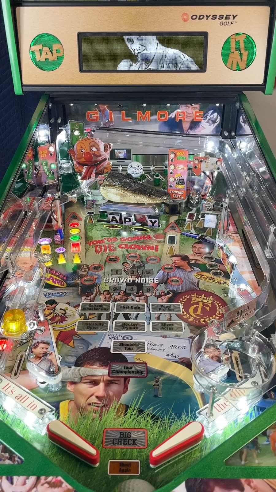 Gilmore golf-themed pinball machine with colorful playfield and digital display