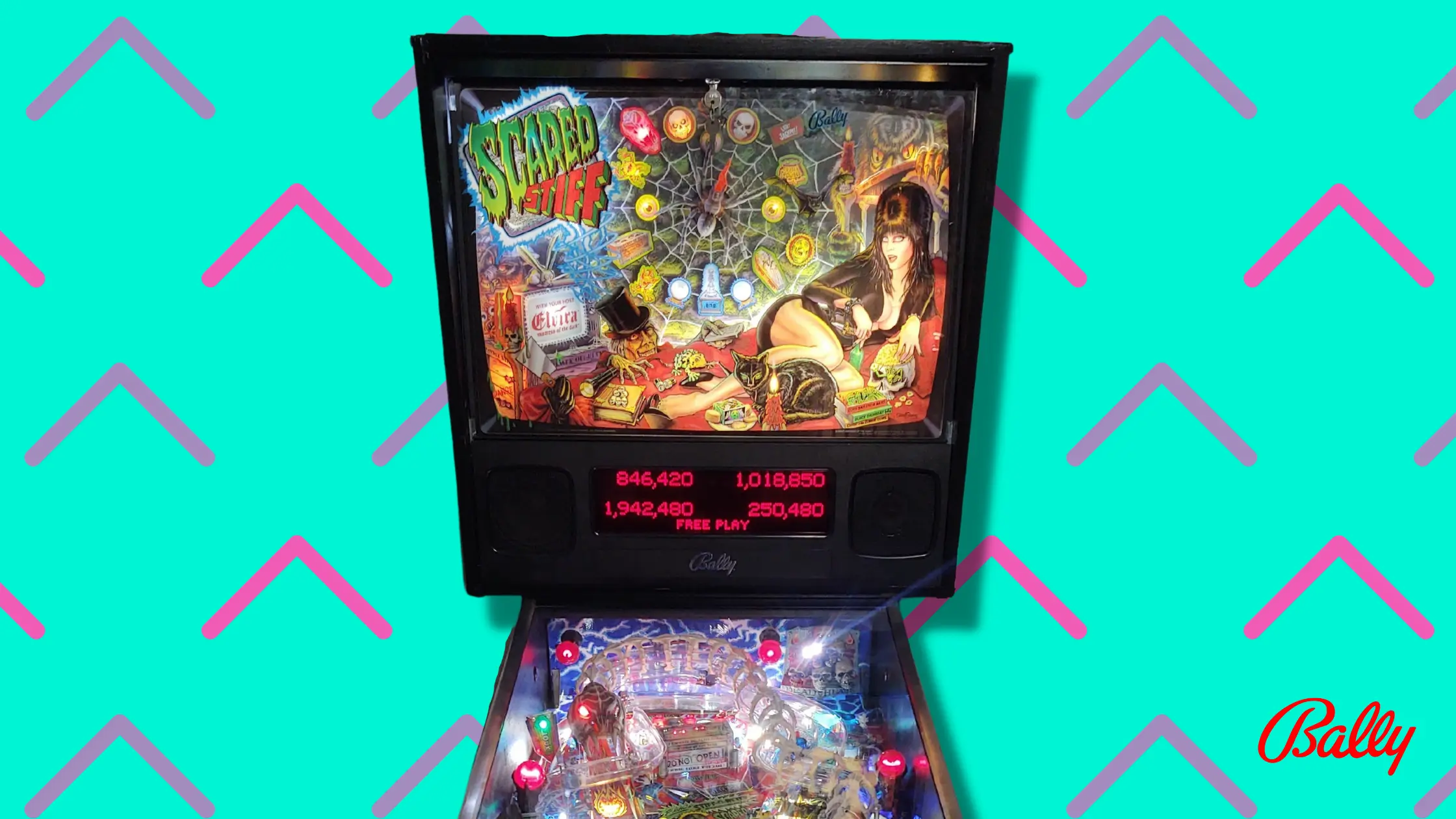 Vintage Scared Stiff pinball machine with colorful horror-themed backglass