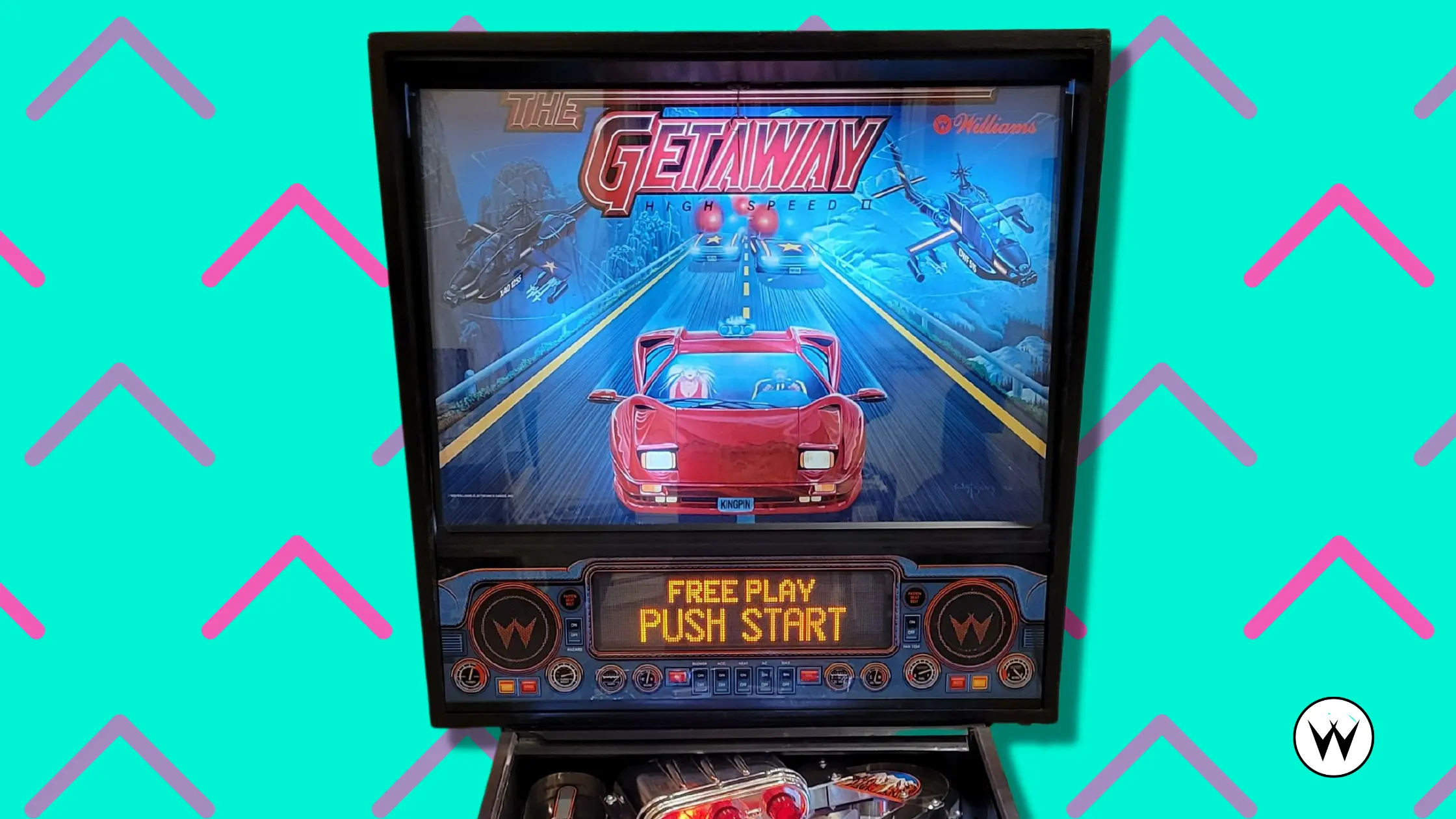 Vintage arcade game The Getaway pinball machine with red sports car