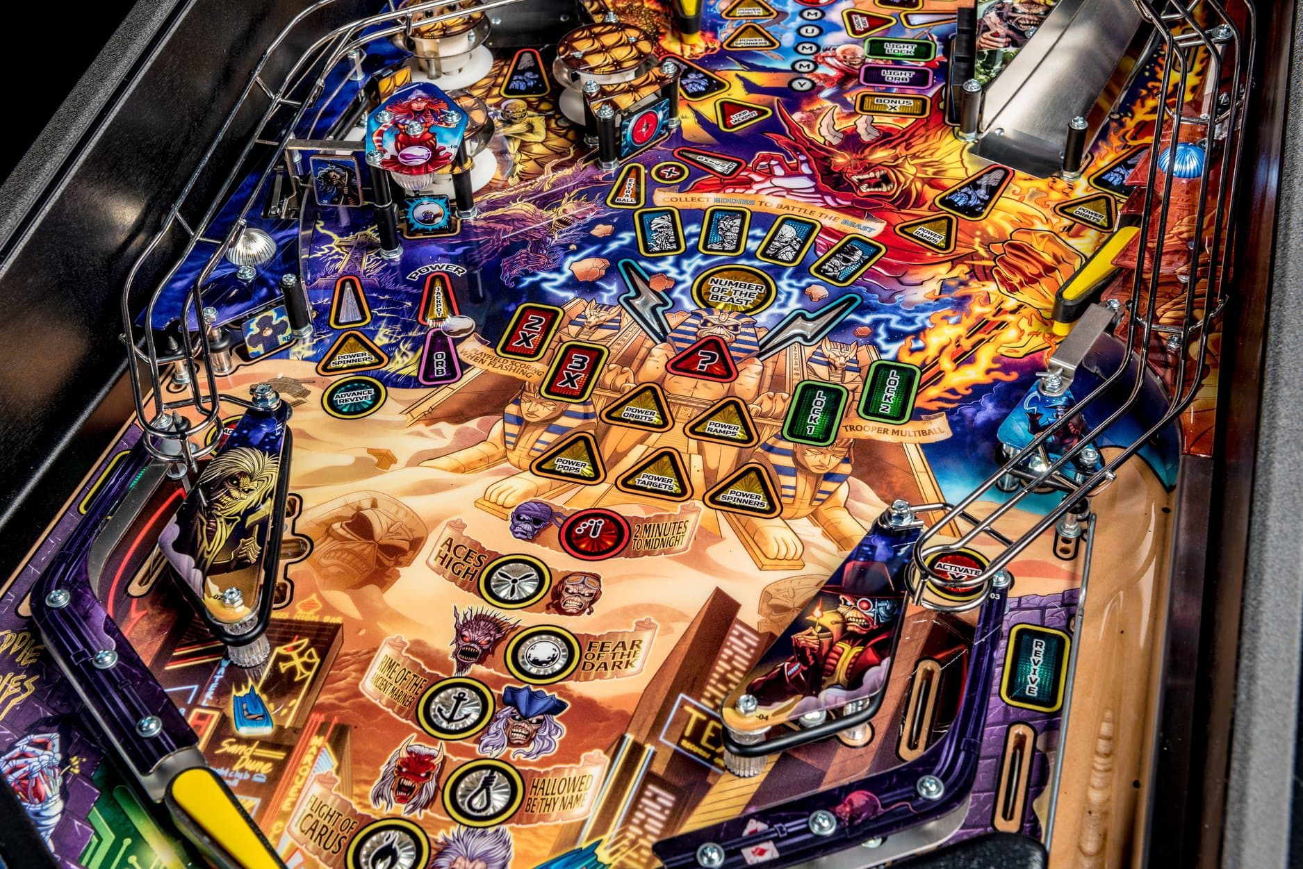Colorful pinball machine with fantasy-themed playfield and multiple scoring zones