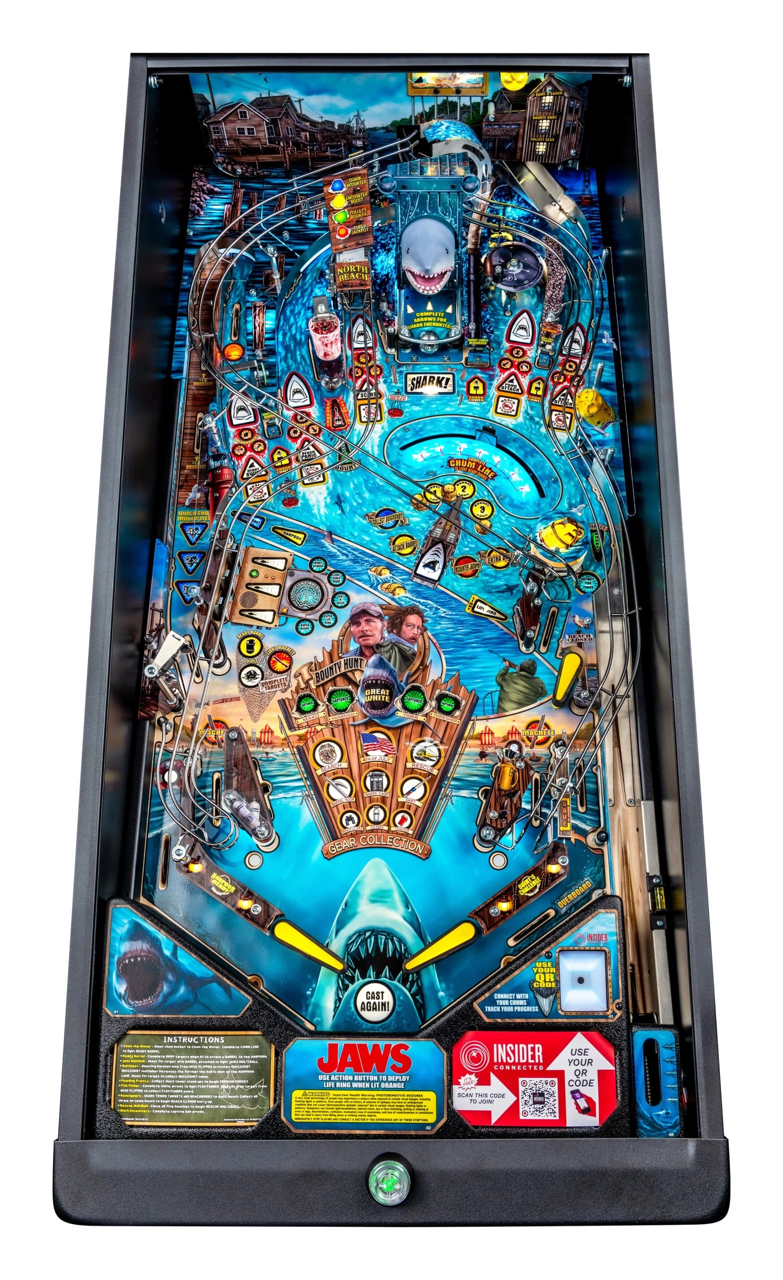 Jaws-themed pinball machine with shark, boats, and blue water background