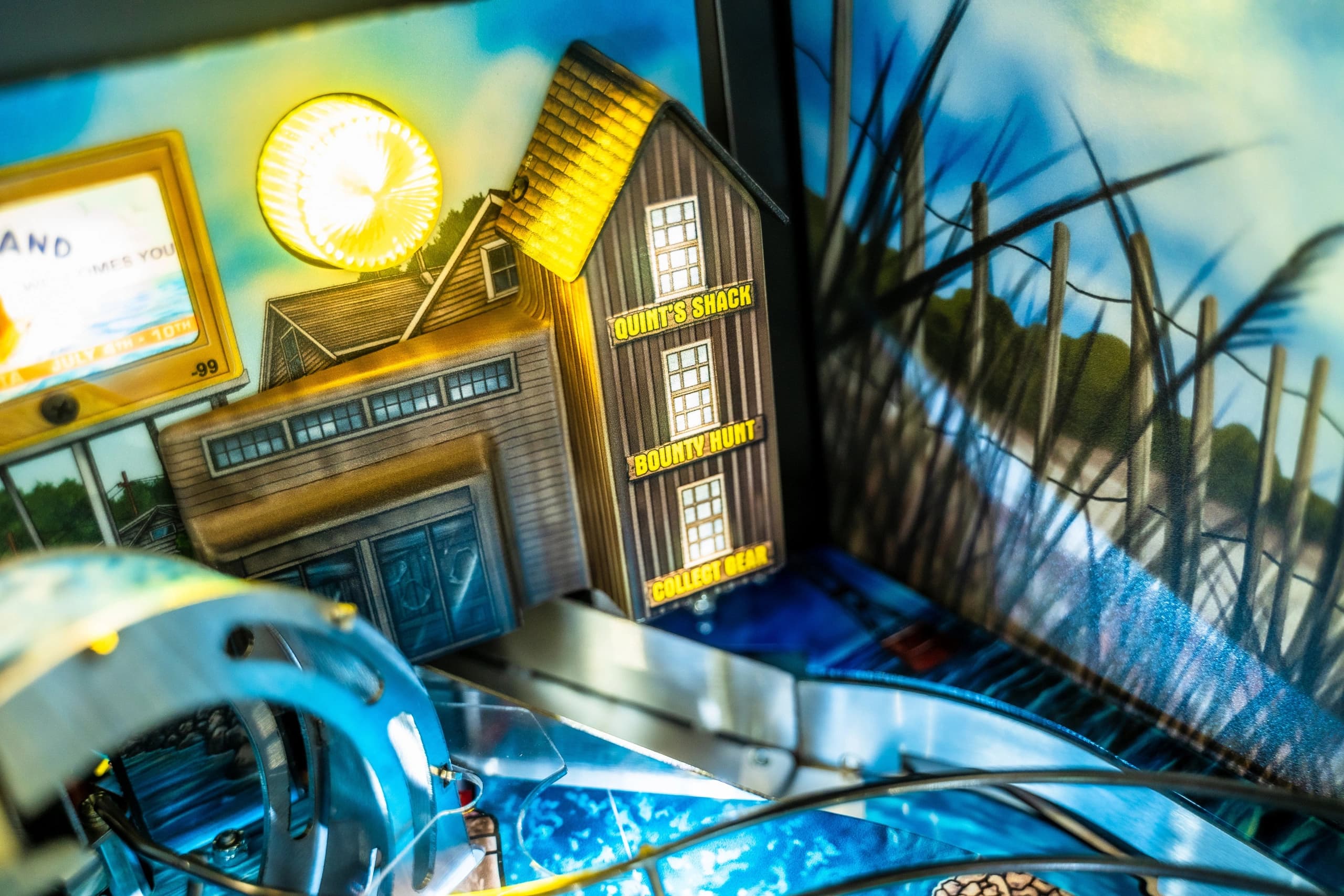 Wooden buildings with glowing yellow light on blurry blue background