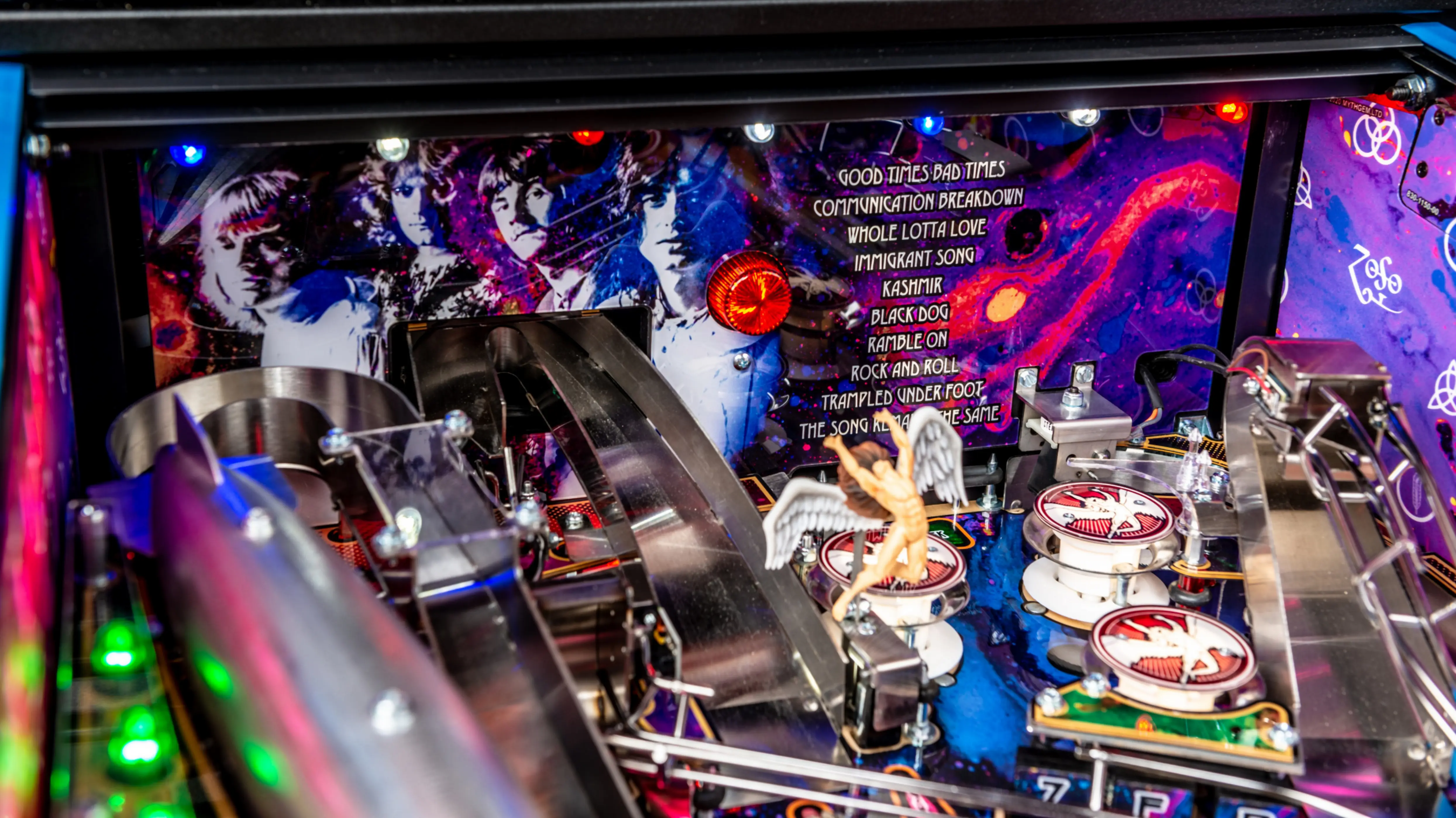 Led Zeppelin-themed pinball machine with colorful lights and band artwork