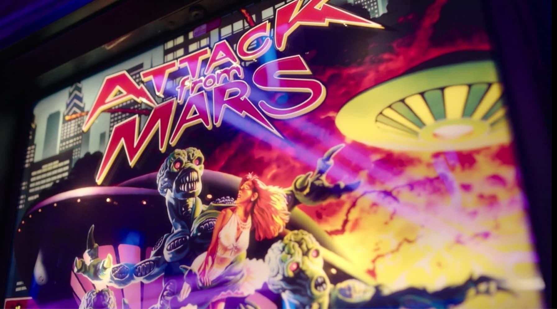 Attack from Mars pinball machine artwork with alien and fiery background