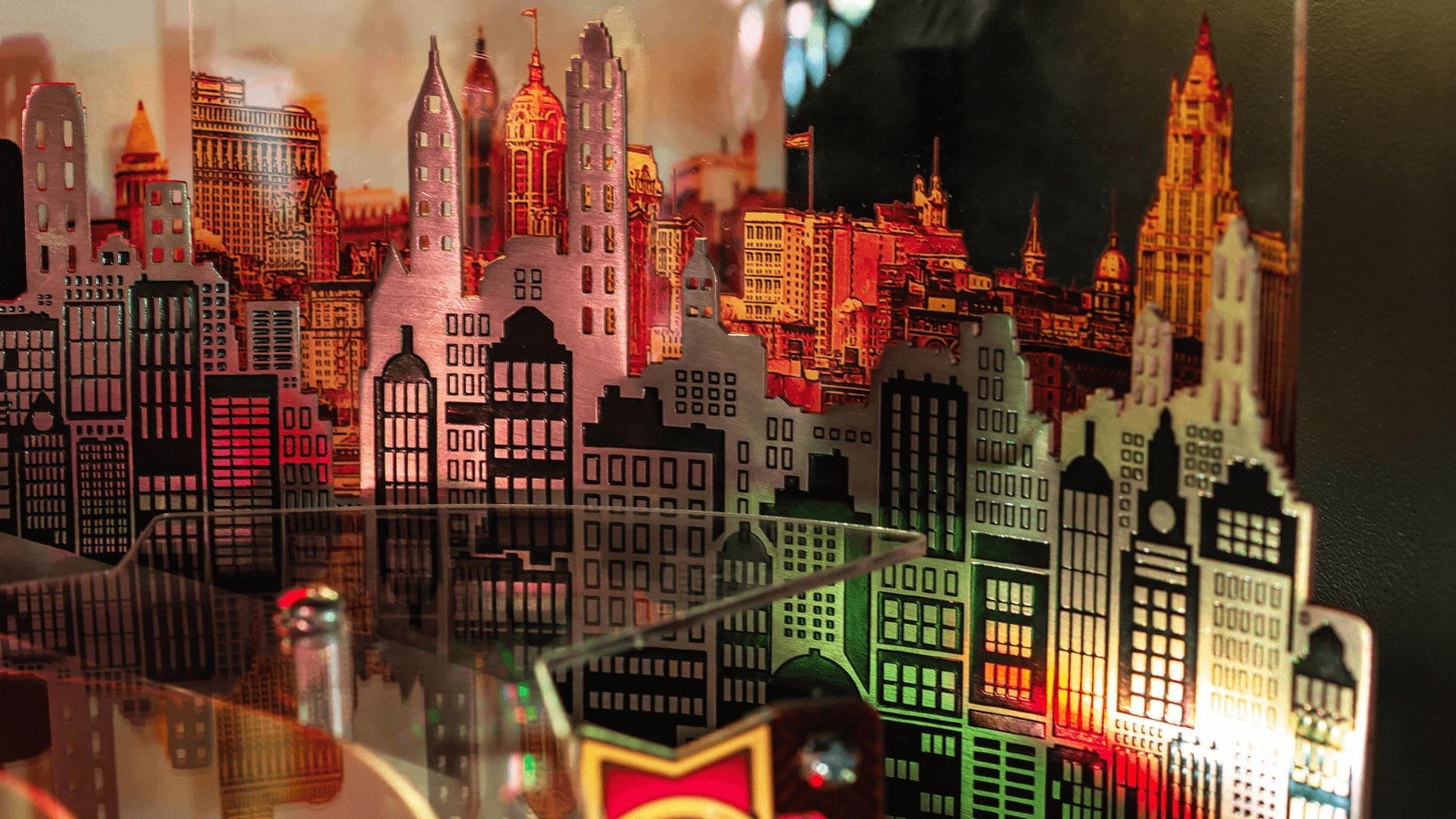 Colorful cityscape model with reflective buildings in warm tones