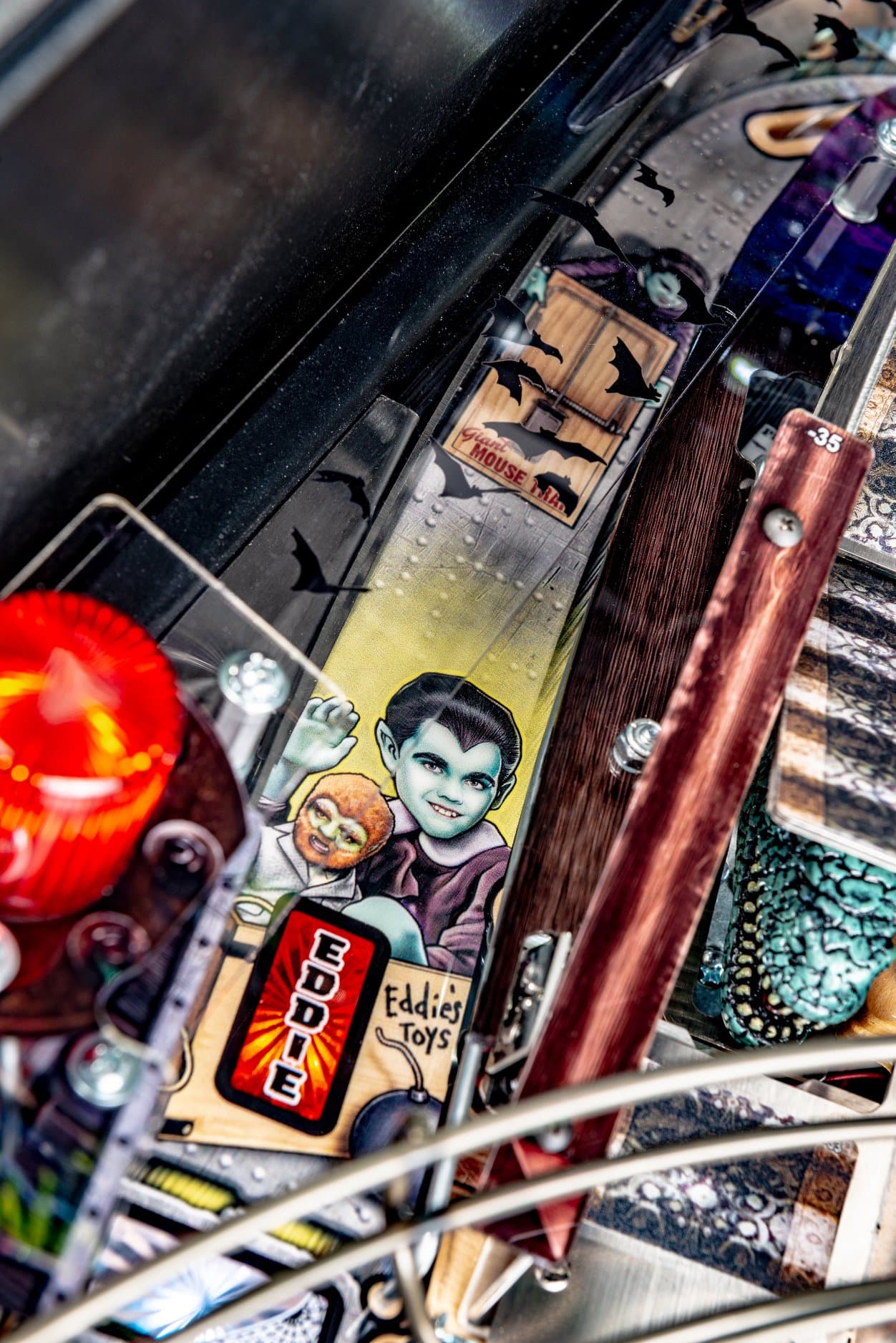 Eddie Toys cartoon vampire pinball machine detail with colorful elements