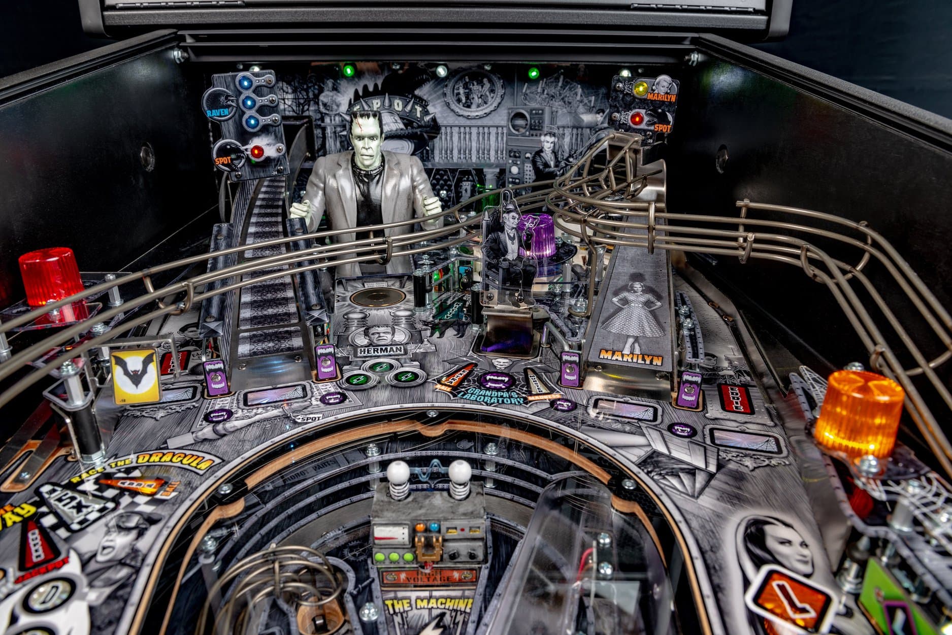 Vintage horror-themed pinball machine with Frankenstein and classic monsters