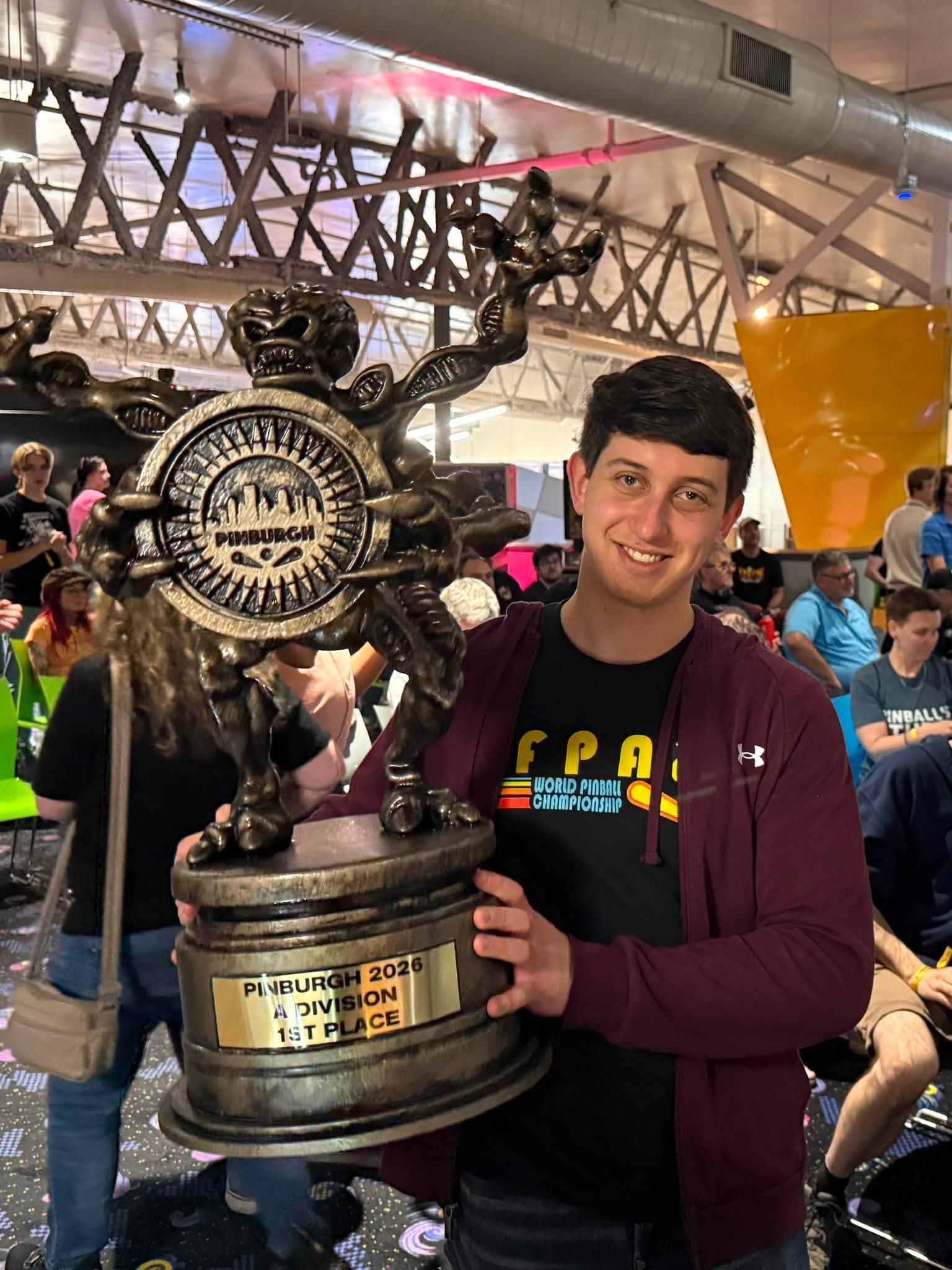 Jason Zahler holding the Pinburgh 2026 World Match Play Championship trophy