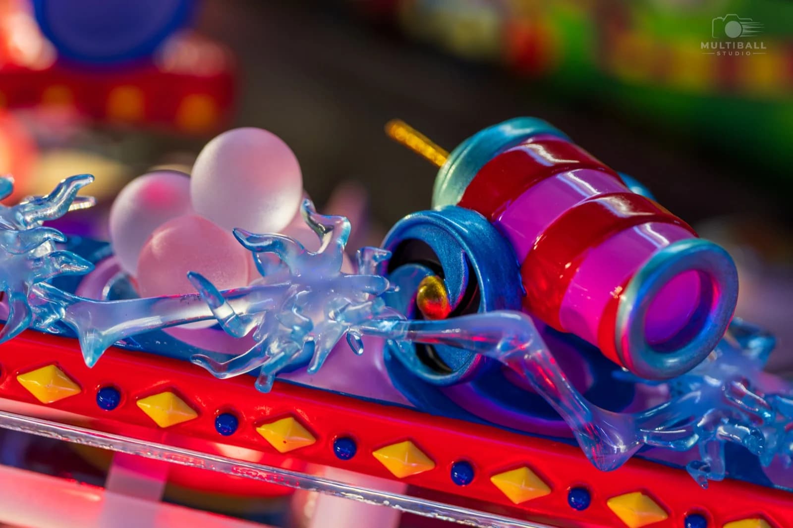 The red and pink cannon toy with clear splash plastics on Cirqus Voltaire