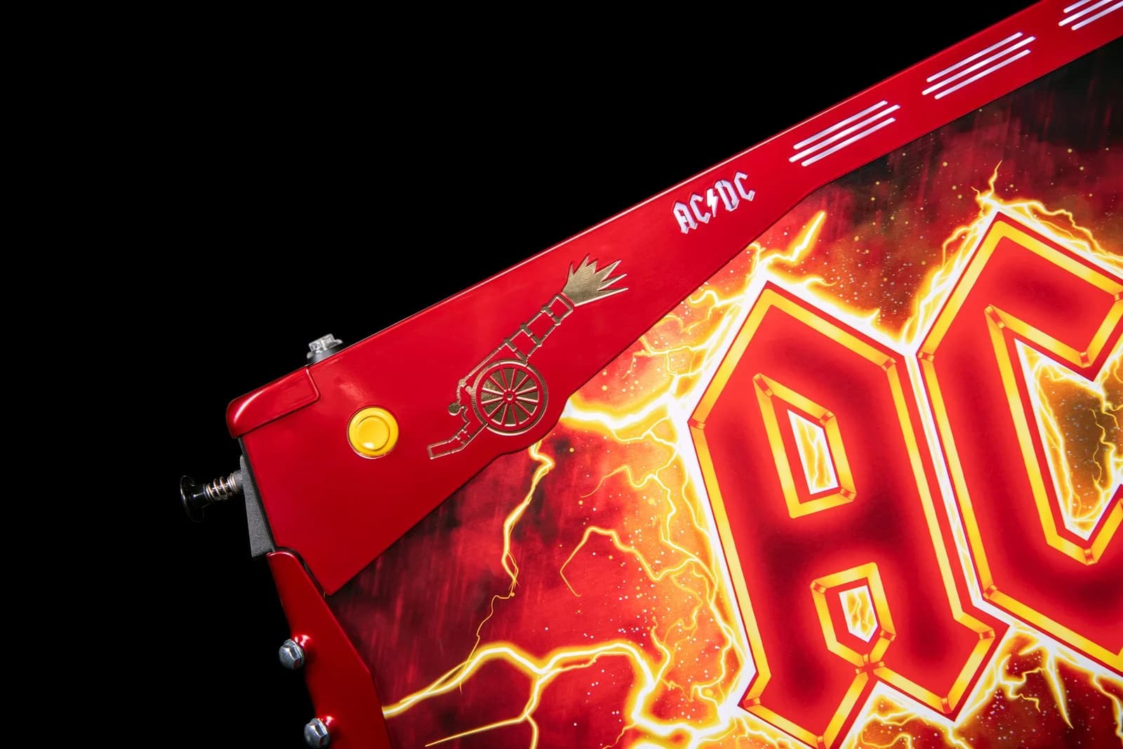 The red LE side armor with a gold cannon on it, next to the yellow Action Button
