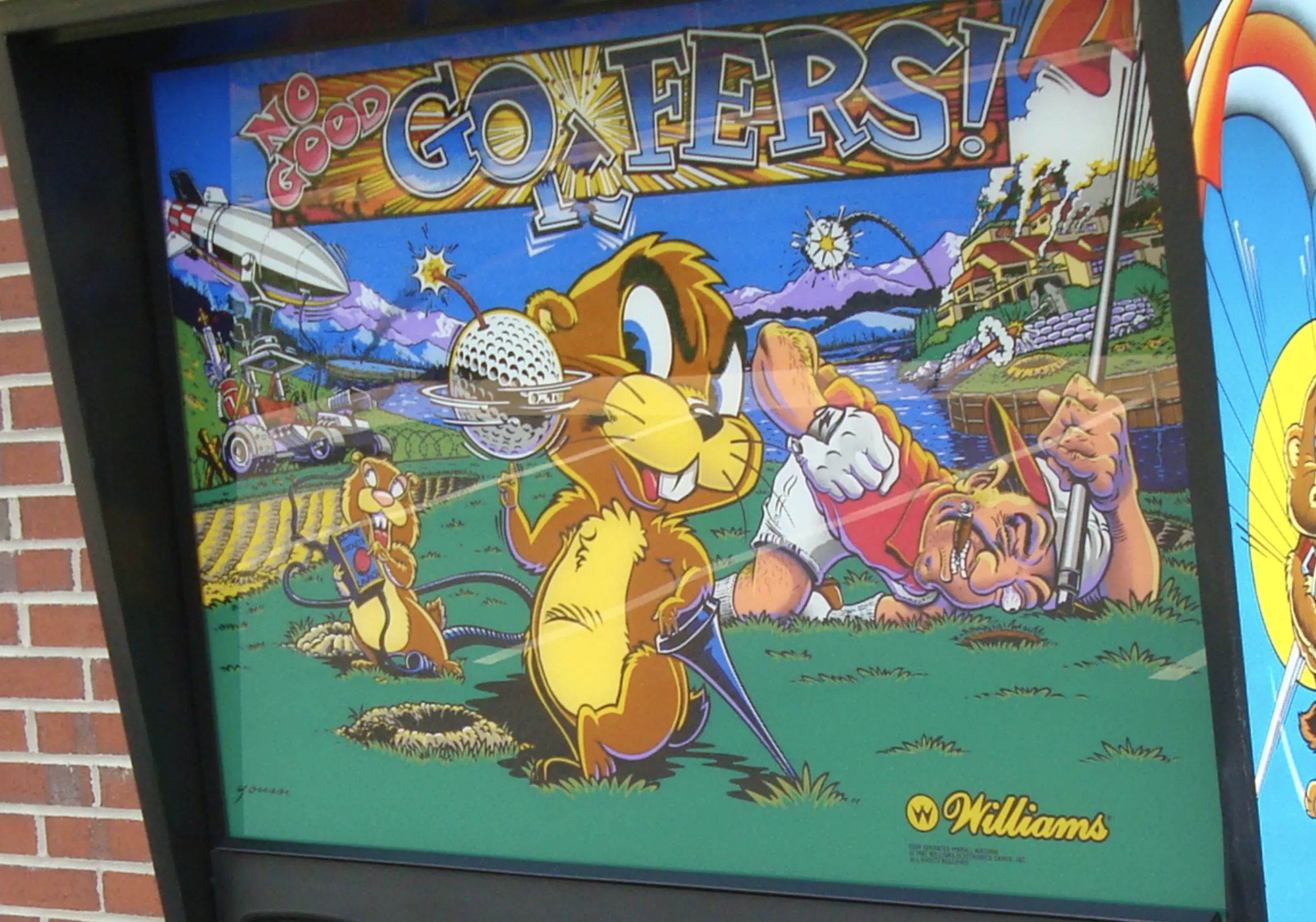 Cartoon lion playing golf with characters and vehicles in colorful landscape