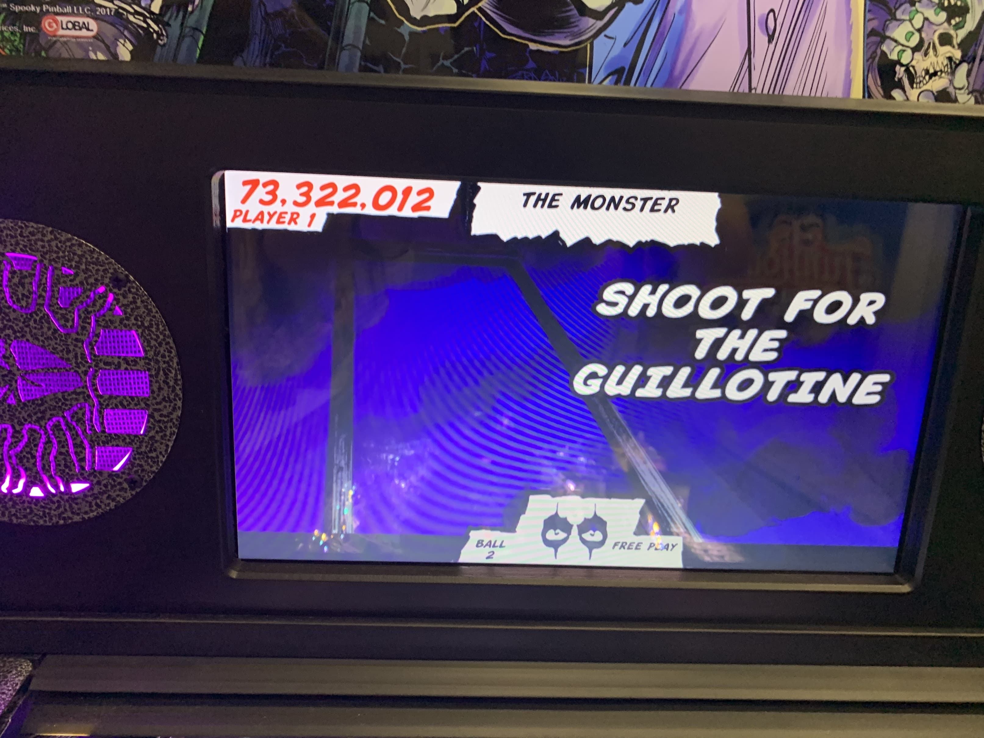 Pinball screen with 'Shoot for the Guillotine' during monster-themed game