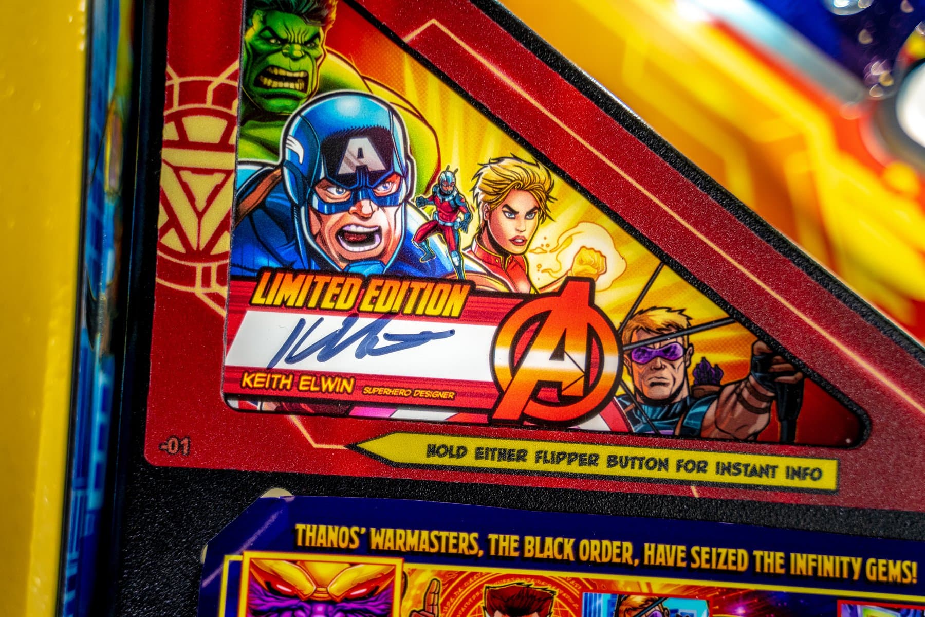 Limited edition Marvel Avengers pinball machine card with superheroes