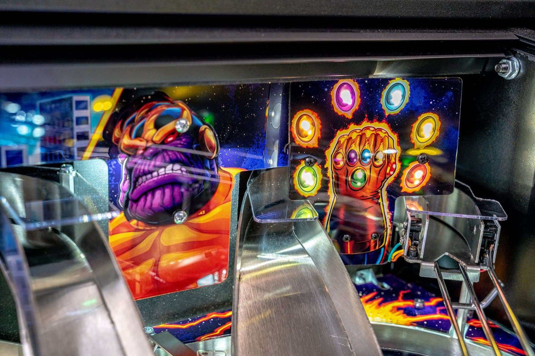 Colorful Marvel comics villain artwork on pinball machine backglass