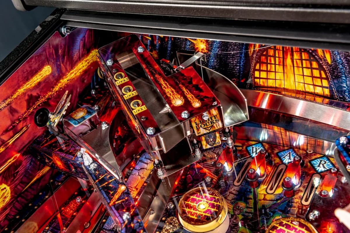Fiery pinball machine with intricate design and glowing elements