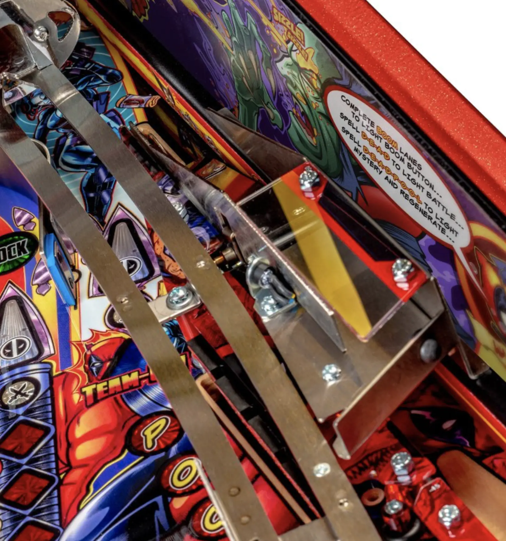 Colorful pinball machine with vibrant artwork and metal mechanism details