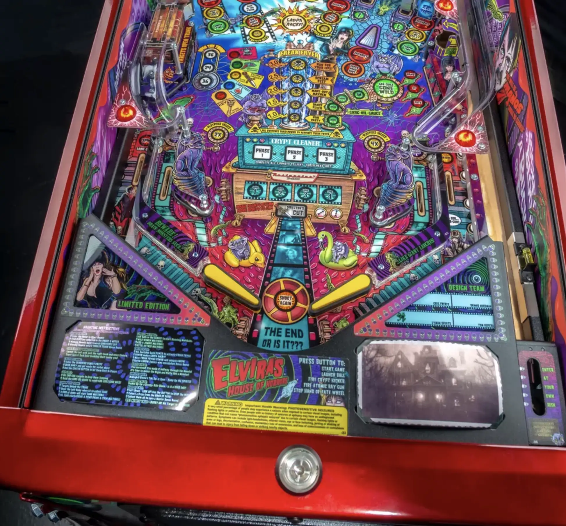 Colorful Elvira's House of Horrors pinball machine with detailed playfield