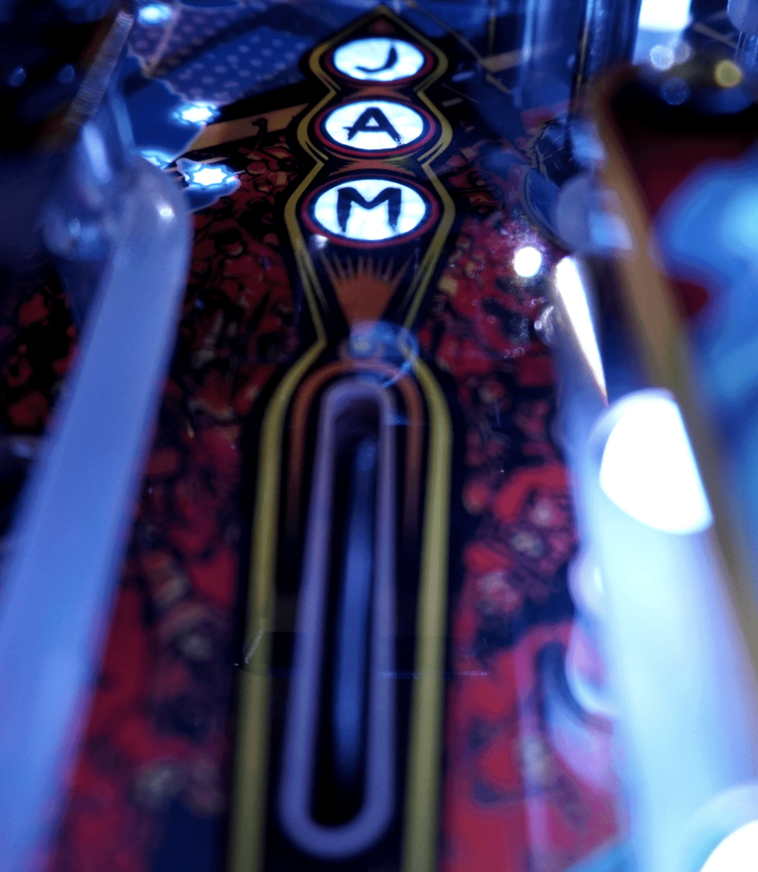 Arcade game buttons with VAM letters in glowing white circles