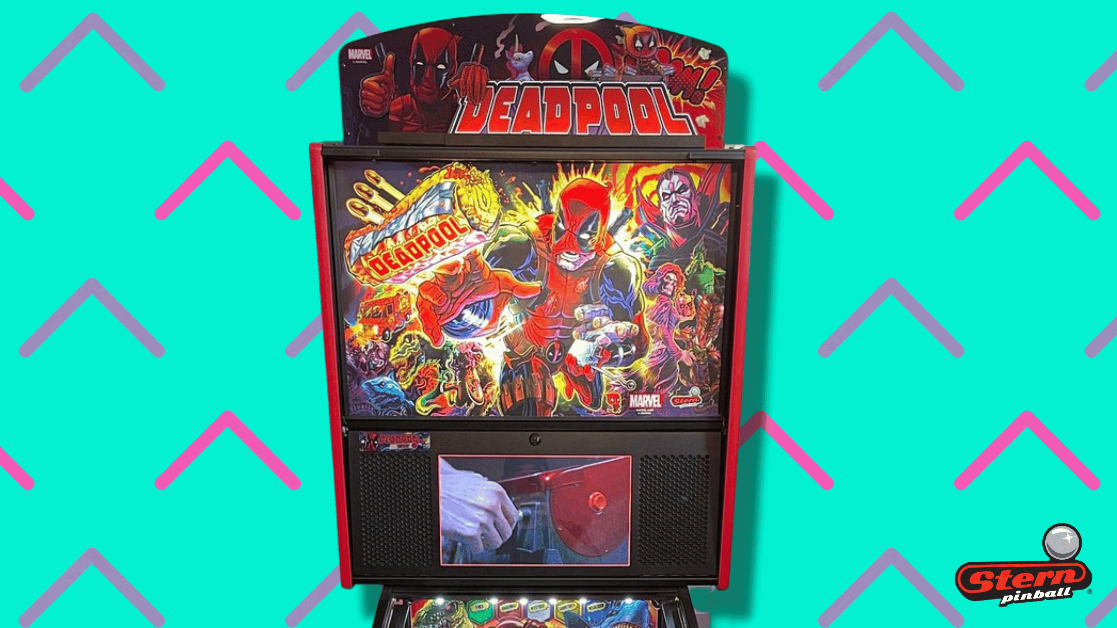 Deadpool-themed pinball machine with vibrant comic art and screen display