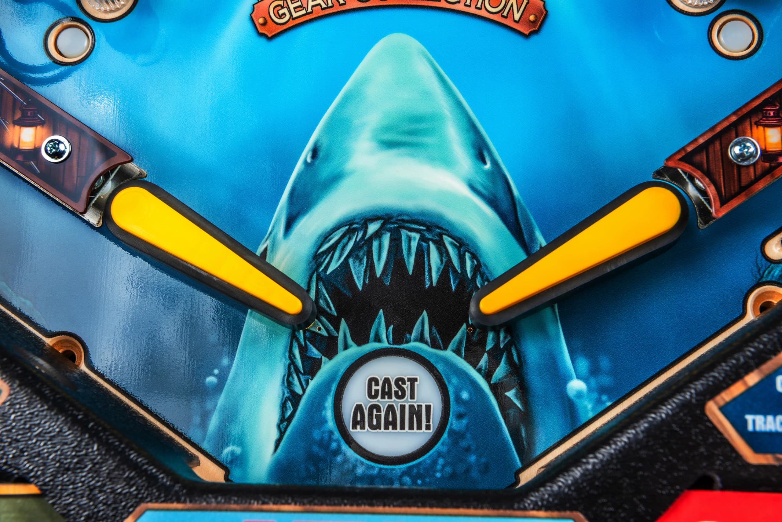 Jaws-themed pinball machine with shark and yellow flippers