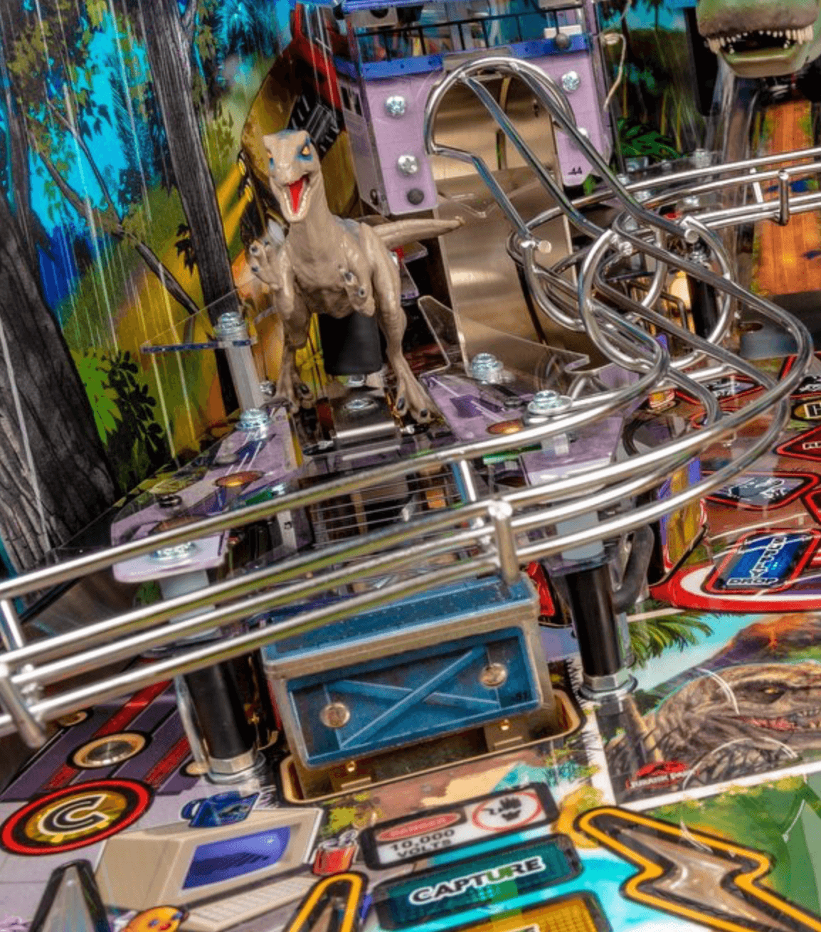 Jurassic Park pinball machine with dinosaur and intricate metal track details