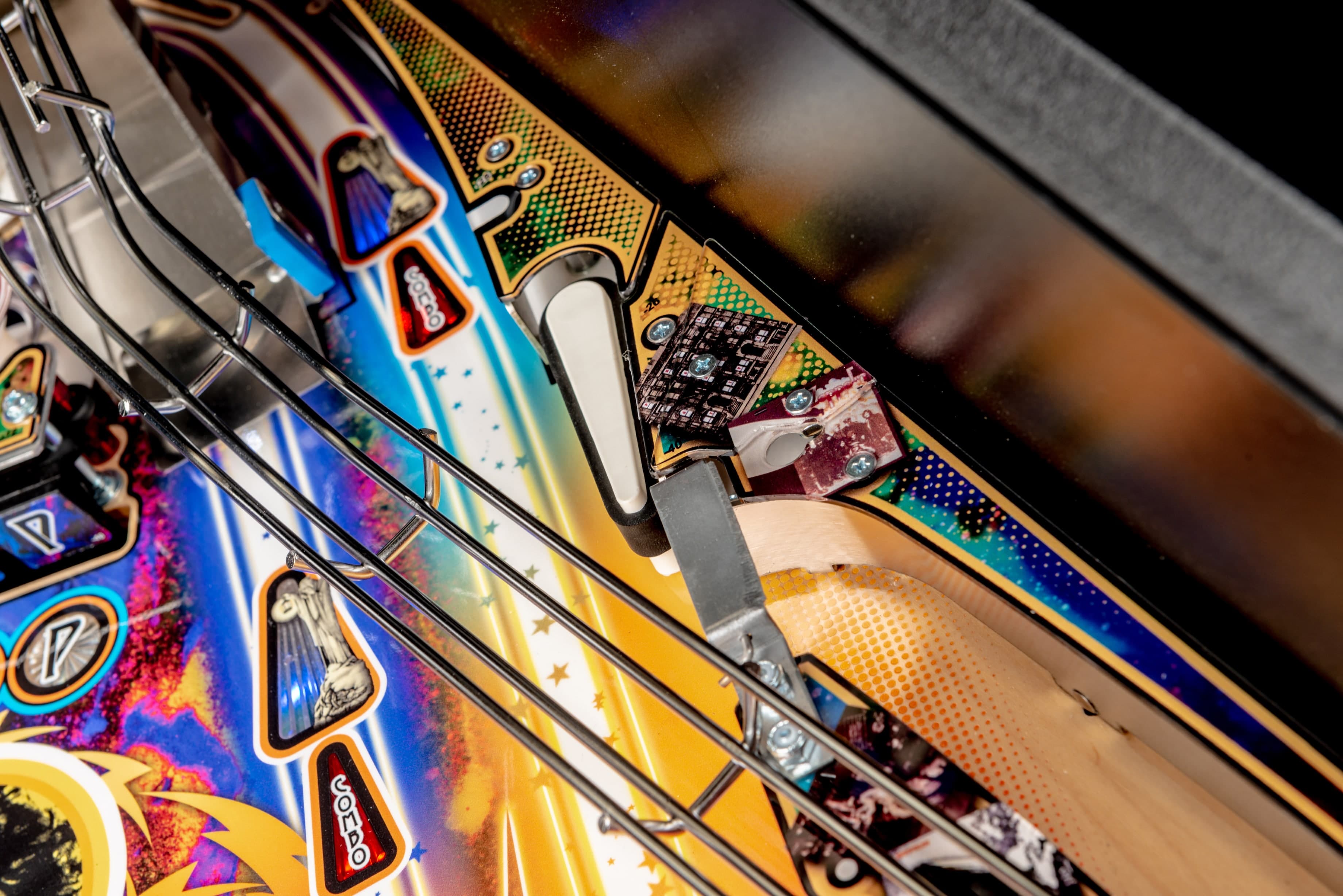 Colorful pinball machine with vibrant design and metal mechanisms