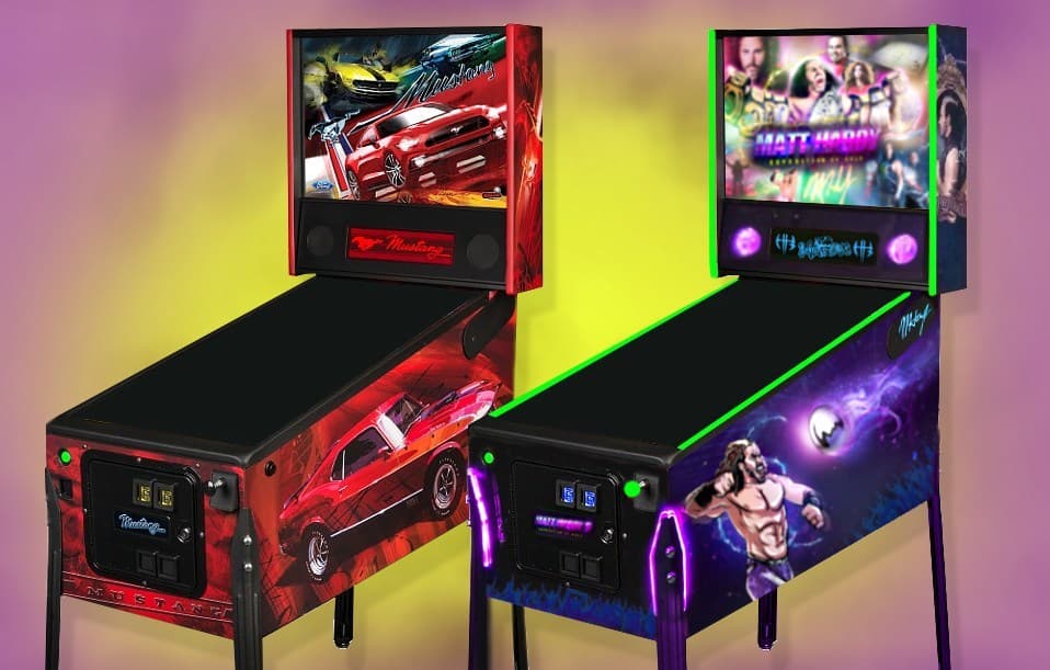 Two themed pinball machines, one with a red sports car, one with wrestling