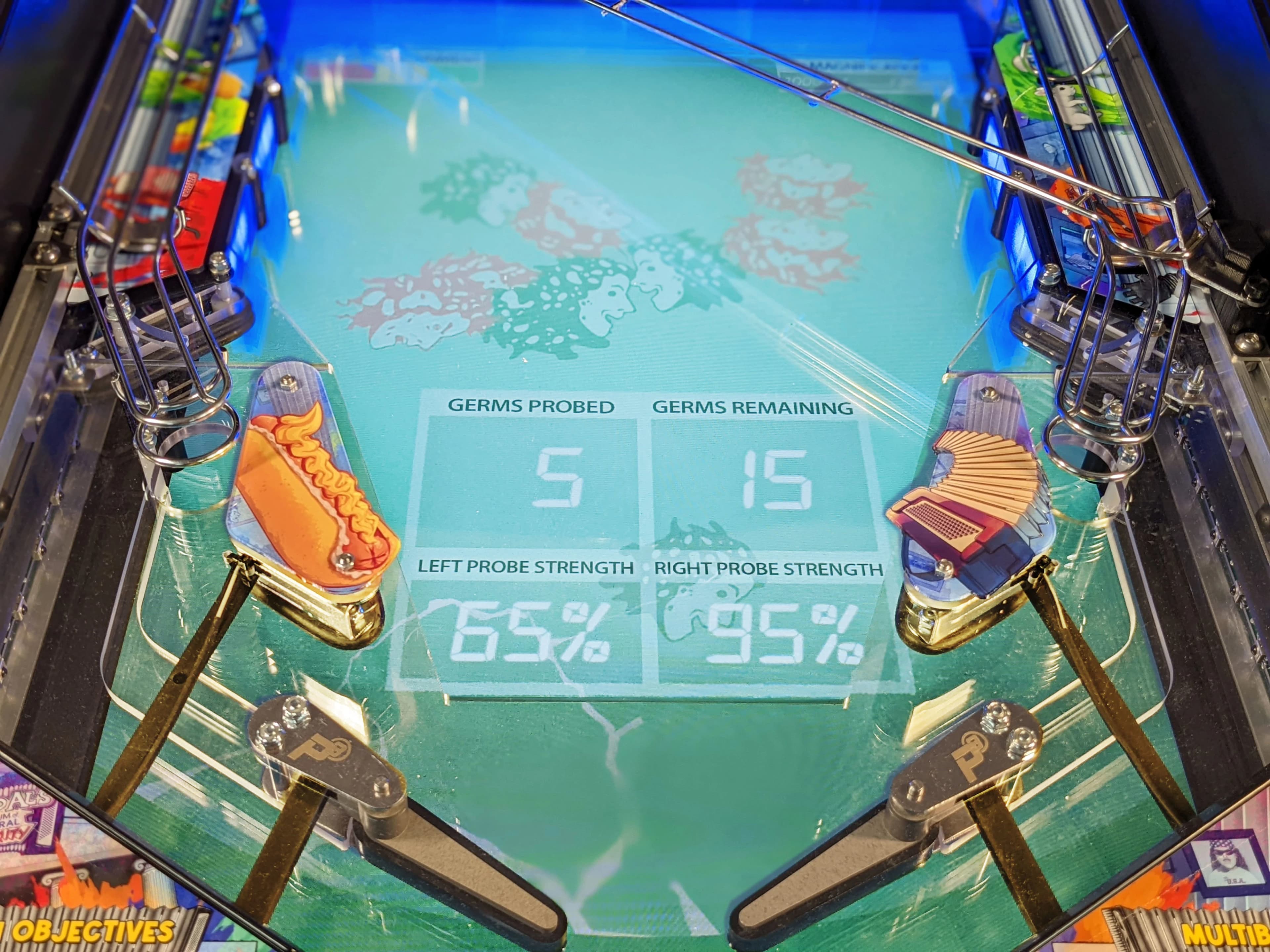 Pinball machine with scientific germ probing game statistics display