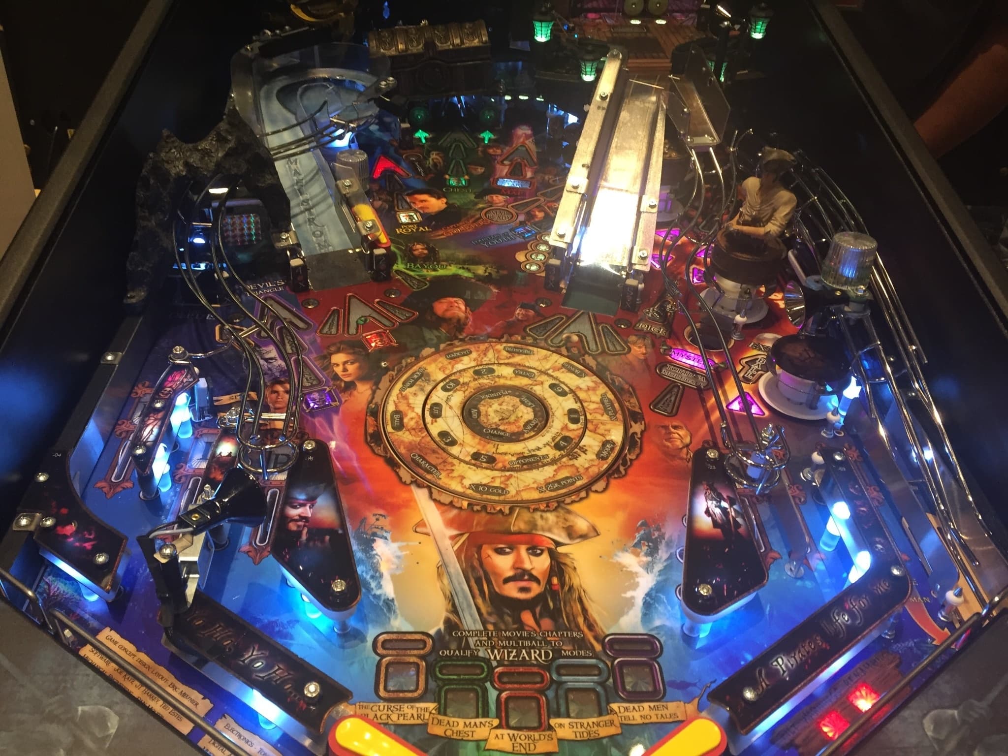 Pirates of the Caribbean themed pinball machine with colorful lights and details
