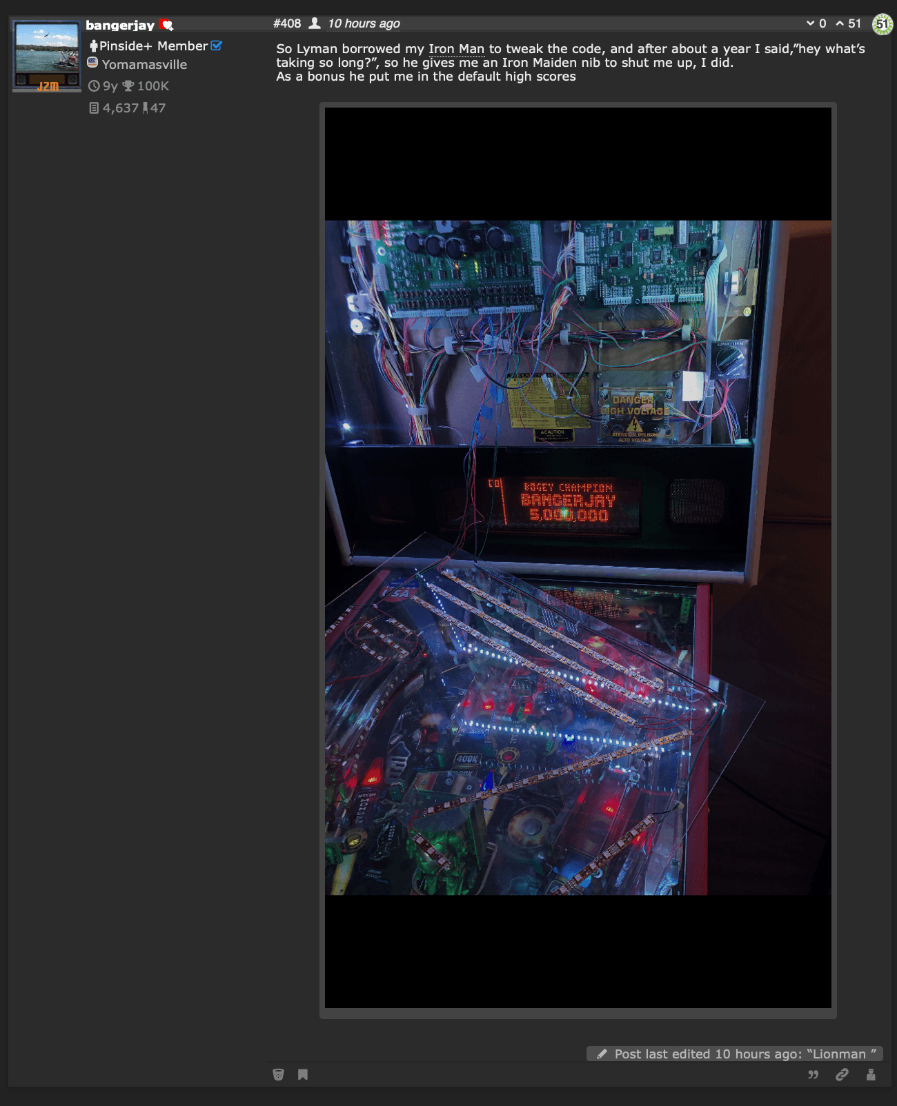 Pinball machine interior with circuit boards, wiring, and high score display