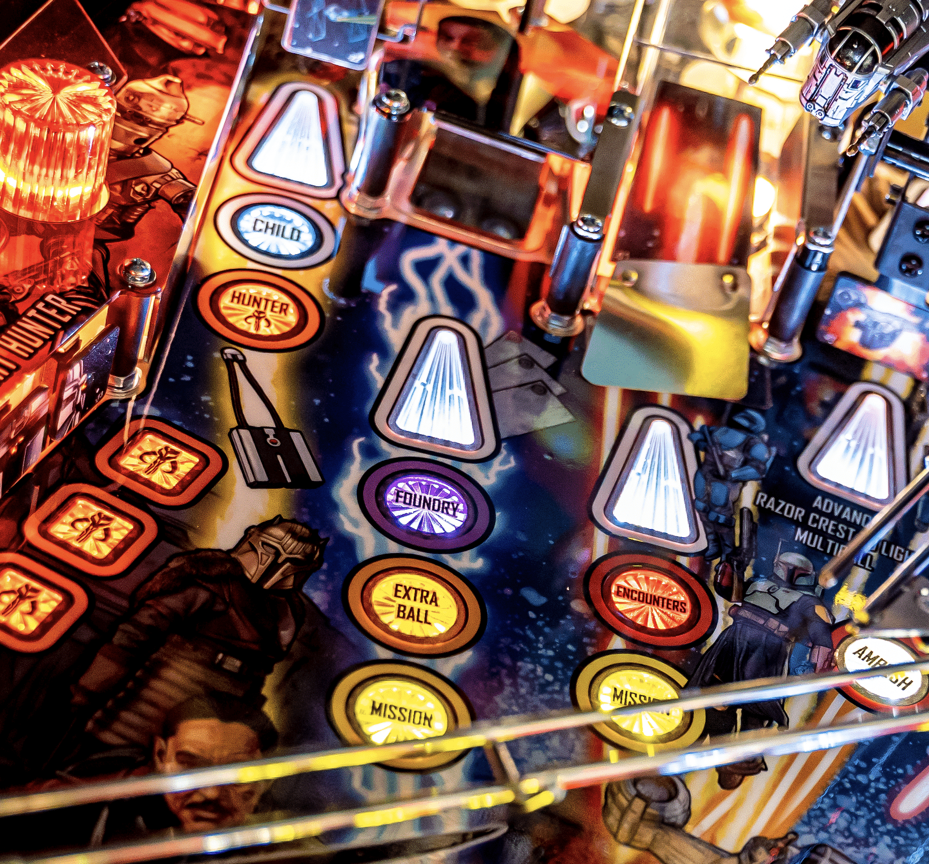 Colorful pinball machine with glowing buttons and sci-fi themed design