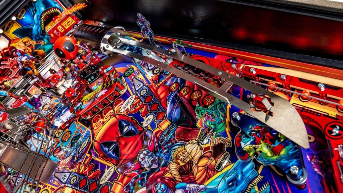 Colorful Deadpool pinball machine with vibrant comic book-style characters and design
