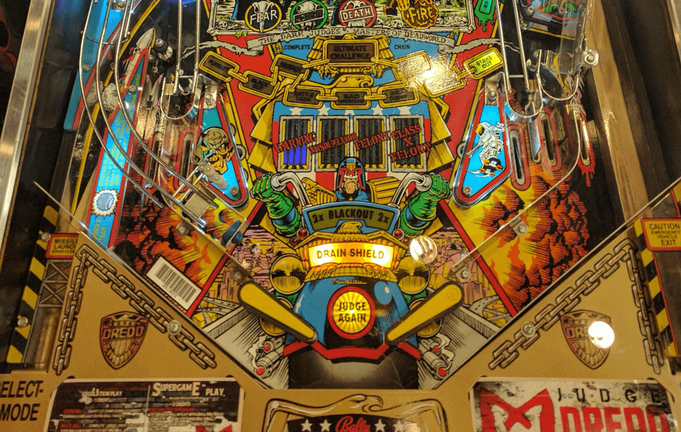 Judge Dredd pinball machine with colorful, detailed playfield artwork