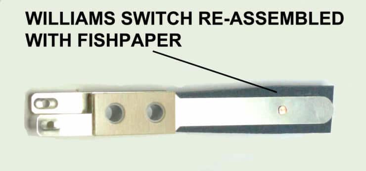 Williams switch reassembled with fishpaper, metallic and white component